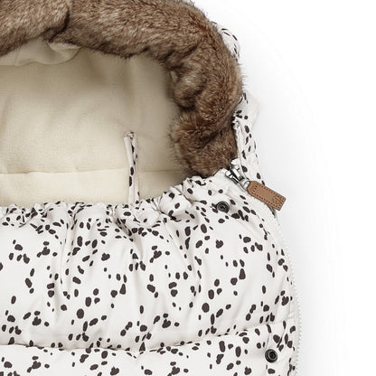 Cozy Fußsack with Dalmatian Dots pattern, featuring thick padding and faux fur trim, perfect for cold winter days.