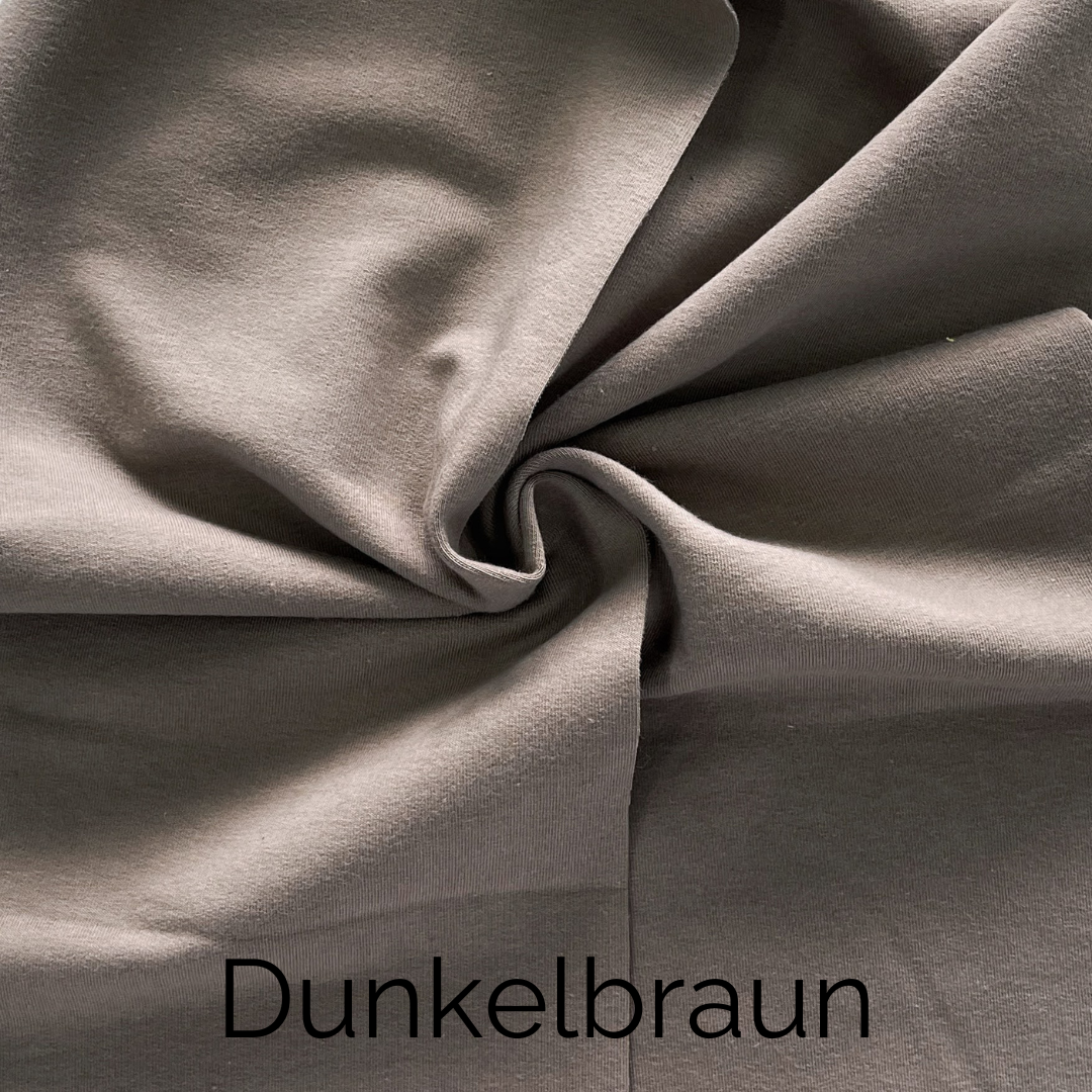 Dunkelbraunes Jersey-Stoffmuster für Knotenkissen Lykke, ideal für modernes Design und Komfort.