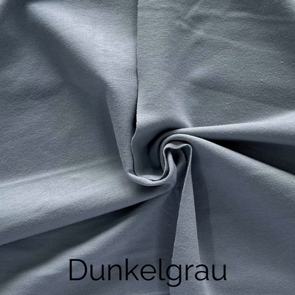 Dunkelgraues Jersey-Stoffmuster, ideal für handgefertigte Knotenkissen und moderne Dekoration.