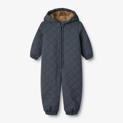 Thermo-Anzug Hayden in Dunkelblau mit Kapuze und weicher Fellfütterung für Babys, ideal für kühle Tage.